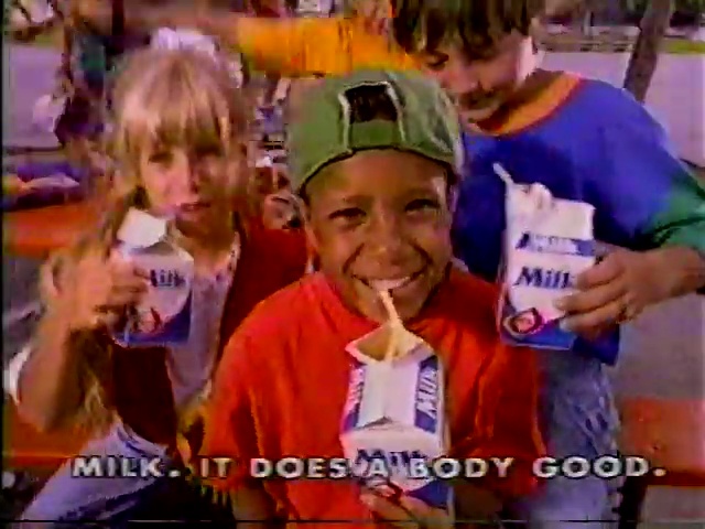 Children holding milk cartons with “Milk. It Does a Body Good.” end card