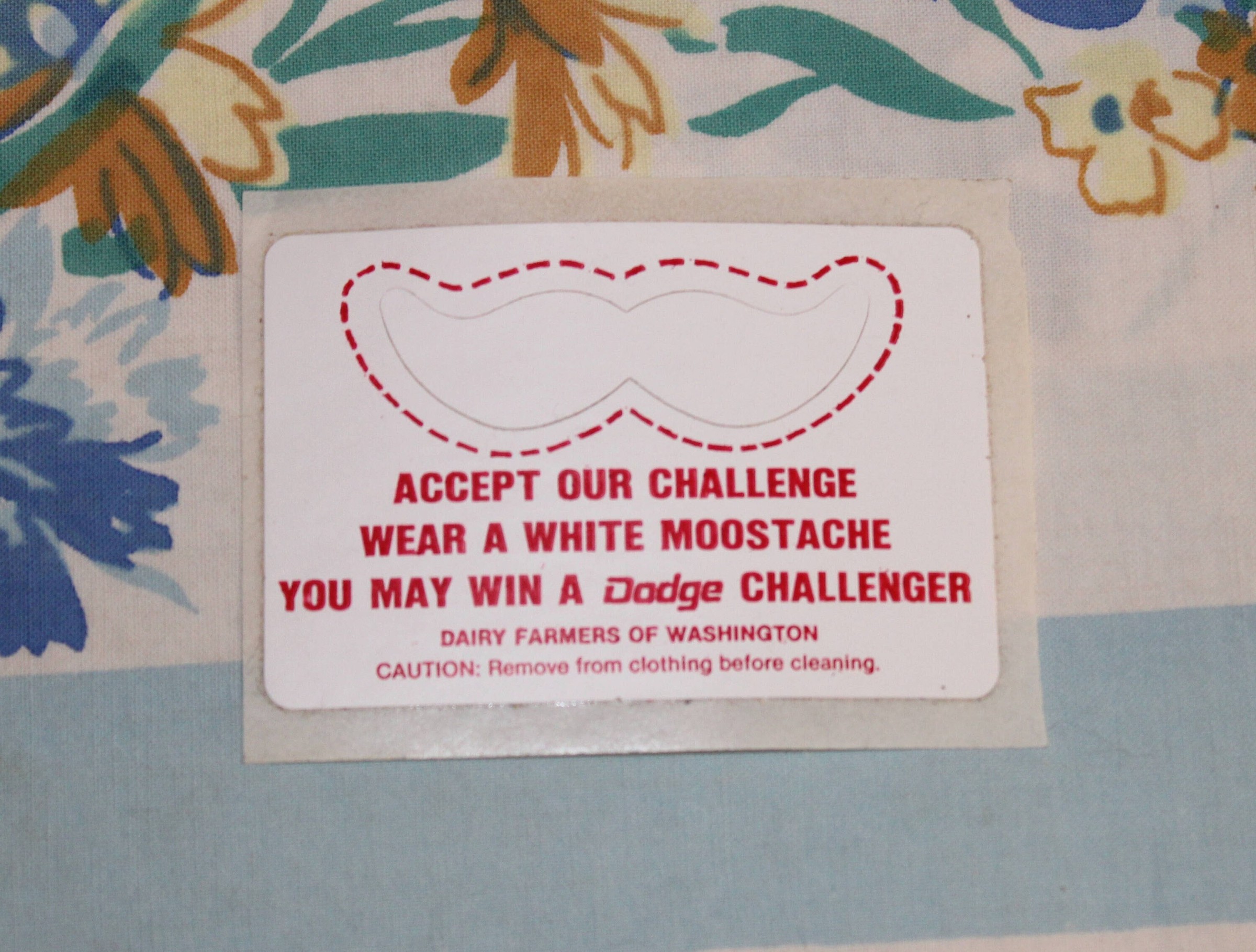 “Wear a white moostache” — Dairy Farmers of Washington (sticker and button)